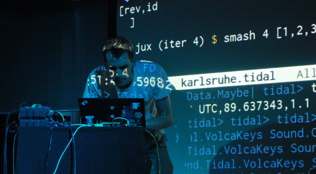 Alex McLean live coding at a music event