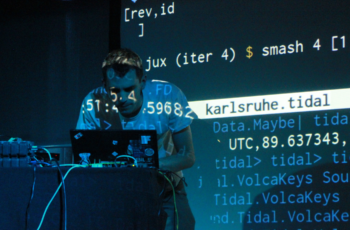 Alex McLean live coding at a music event